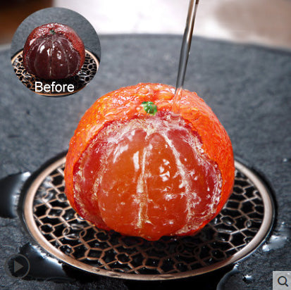 Magic Tea Pet - Orange (half-peeled)